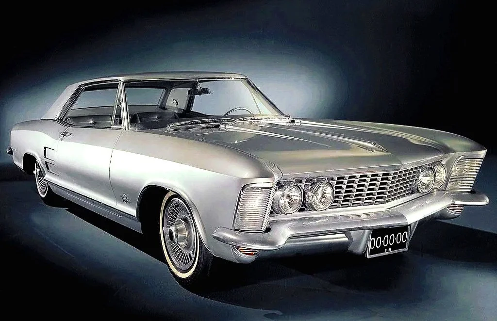 ink to original Buick Riviera automotive advertising gallery. Image displays a highly stylized 1963 Riviera Boattail.