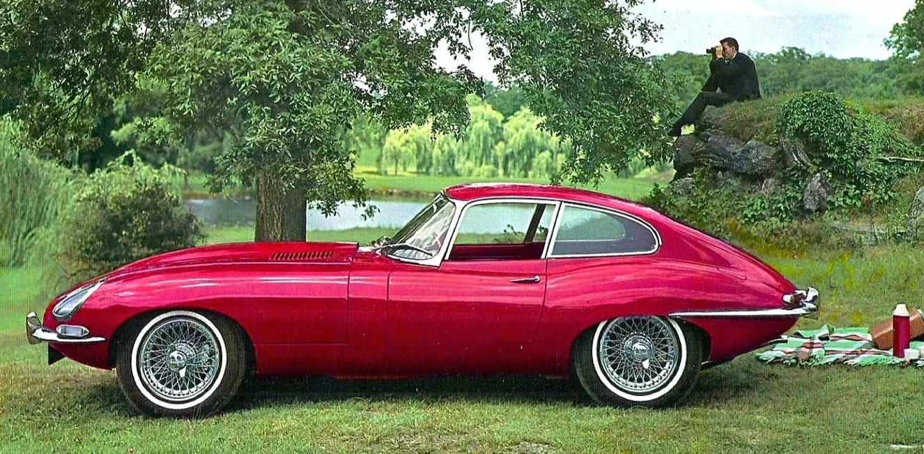 A curated gallery of vintage print advertisements and factory literature for classic Jaguar motor cars, including the E-Type, XK series, and luxury saloons.