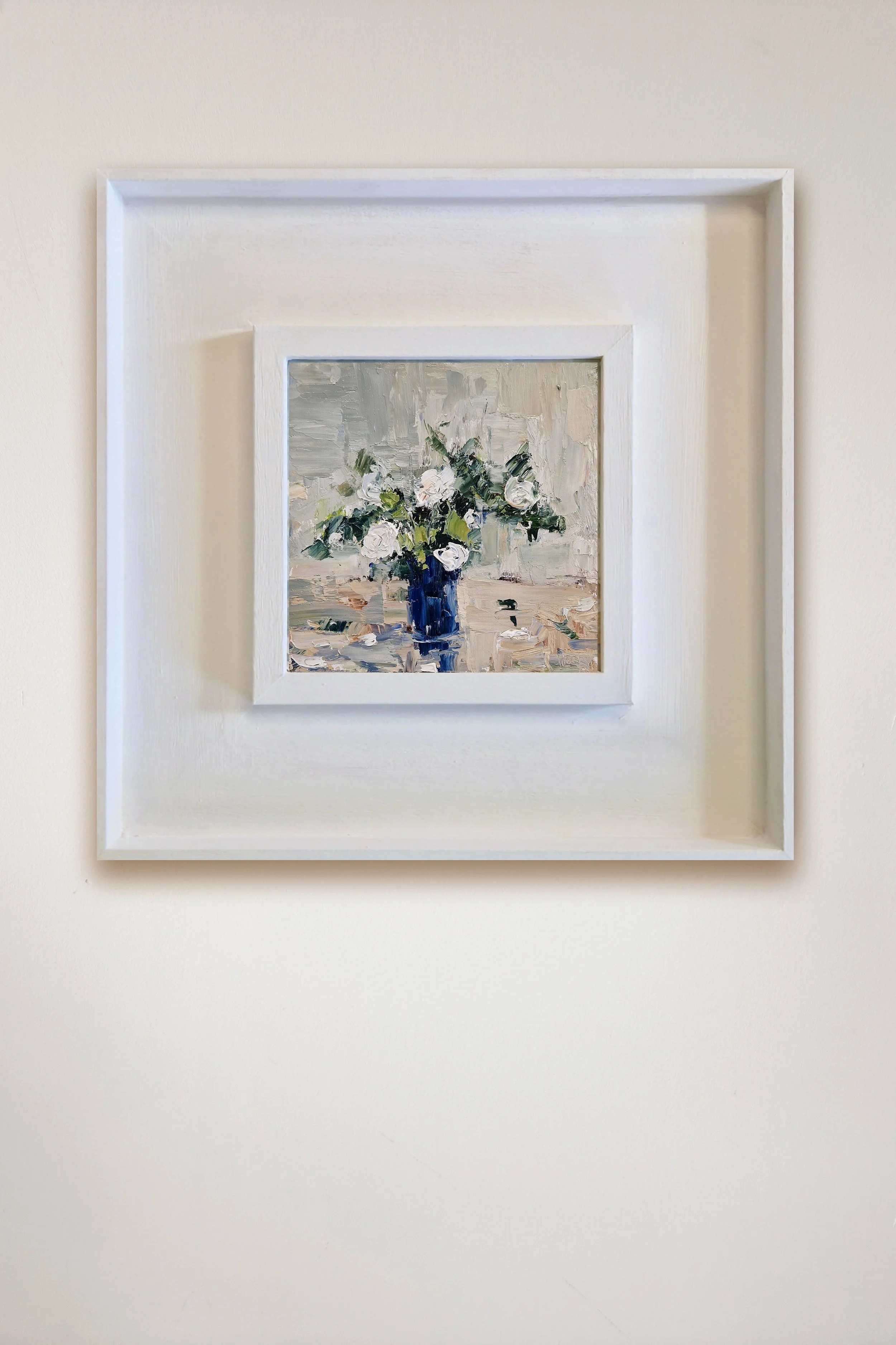 white roses framed on wall.jpg