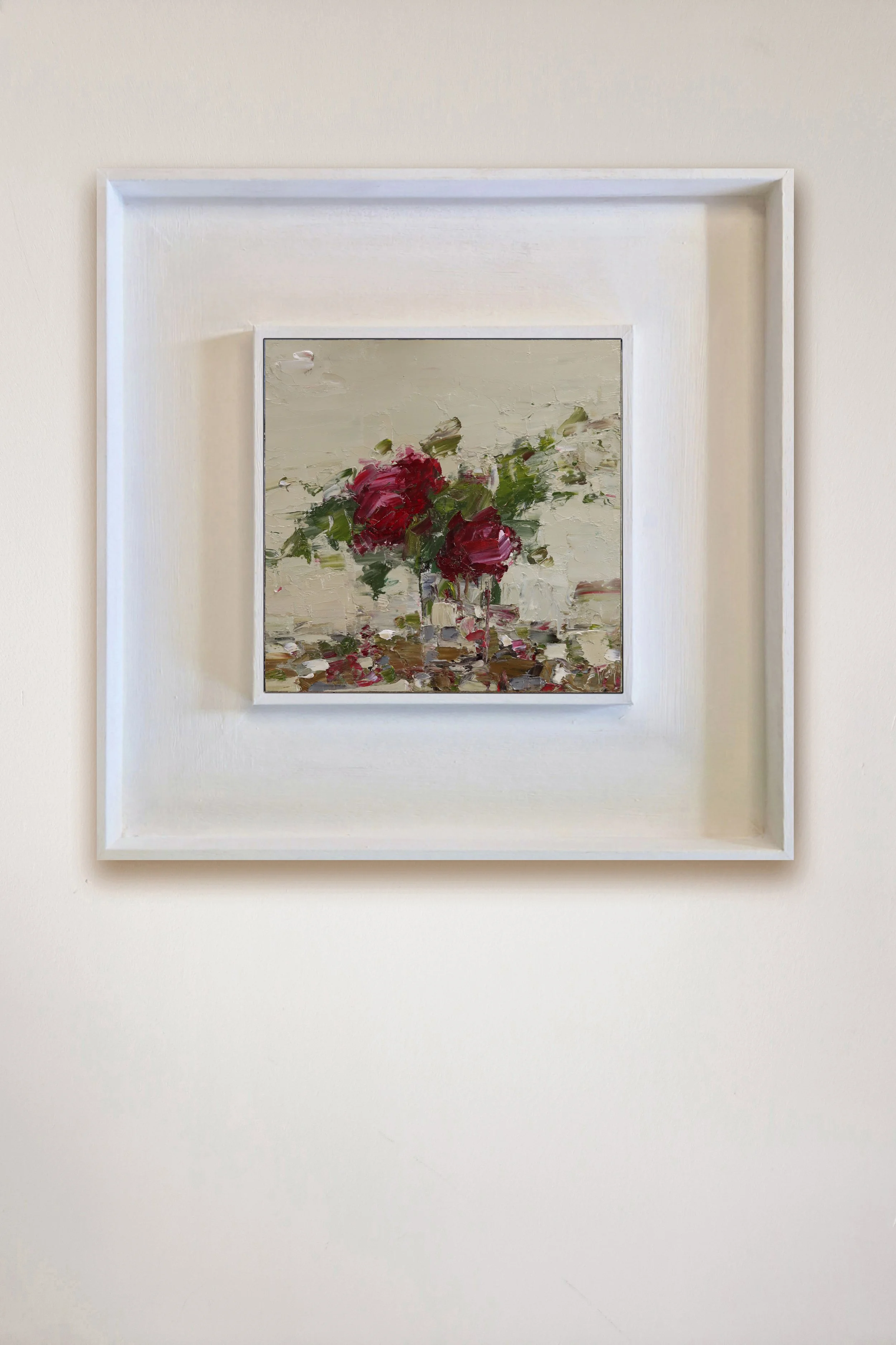 two red roses on wall.jpg