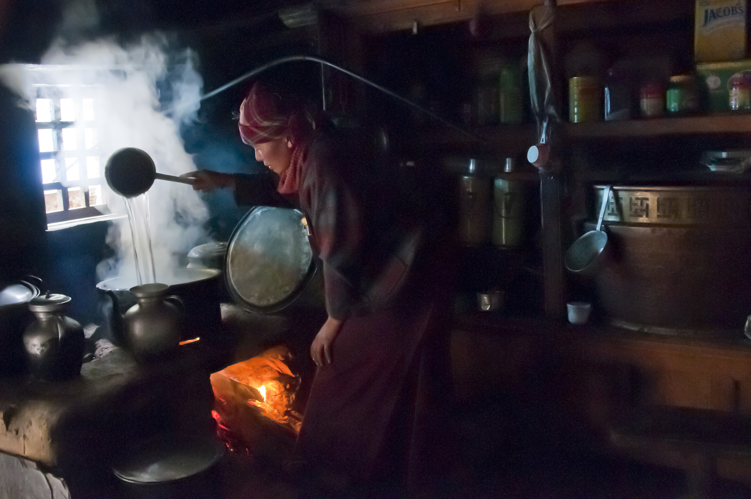 nun in kitchen at Lungdang Gompa R Mendes-Flohr .jpg