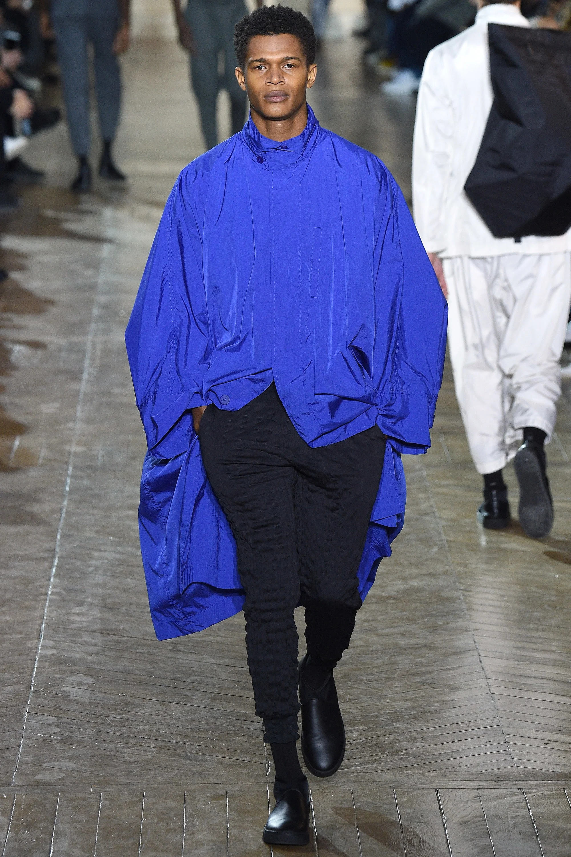 The most beautifully bold blue parka. Issey Miyake, Courtesy of Vogue. 