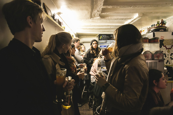The cantina - often too packed with guests to make out the hidden door in the back. Courtesy of Quixotic Projects. 