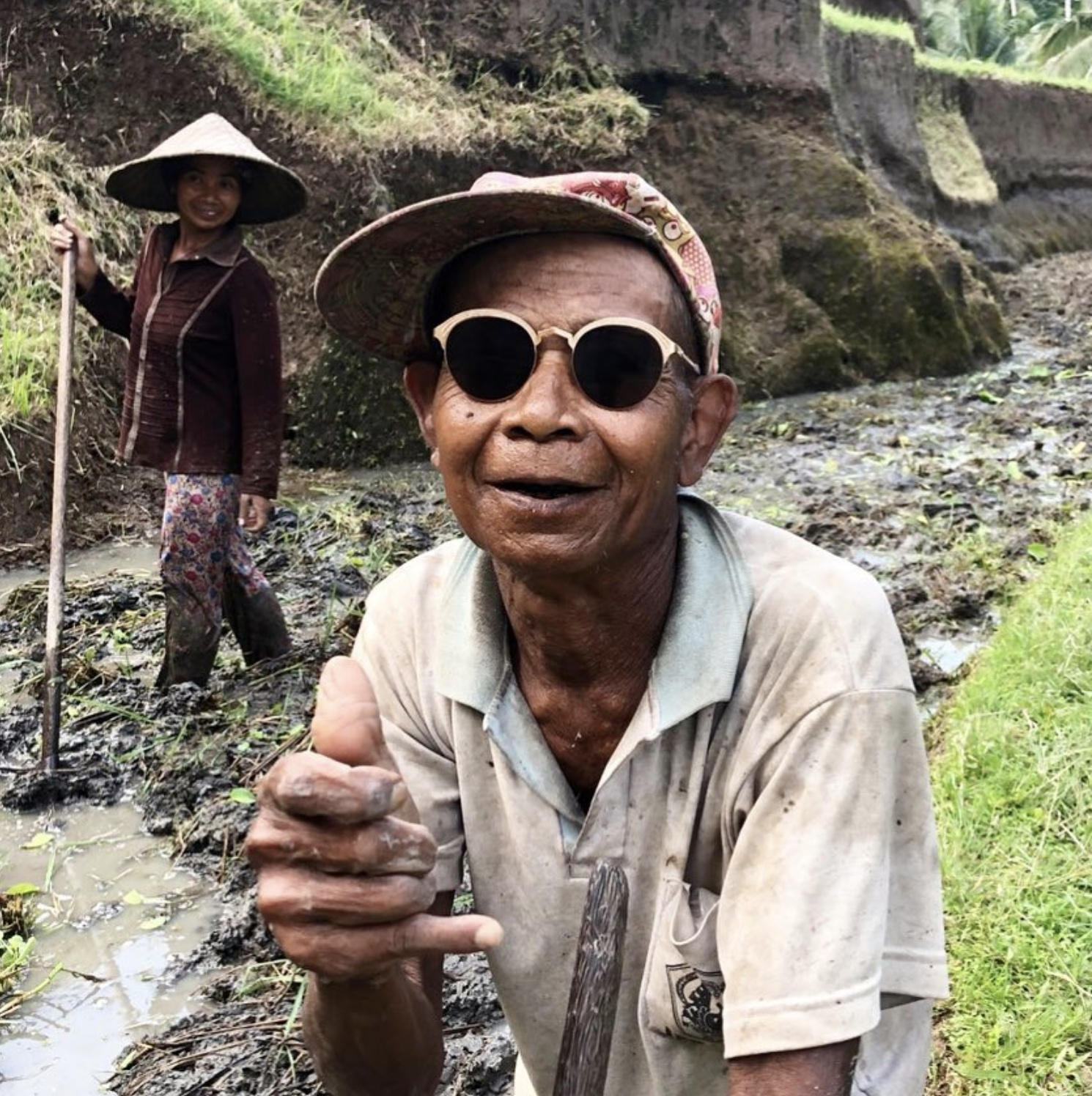 Not only is rice farming a major staple to the Balinese economy, but it's also the center of many traditional Balinese rituals, as the farming process is seen as a cycle of hard work, spiritual connection, and celebration. Pictured here is a local farmer we spoke with sporting the É tienne Marcel frames. 