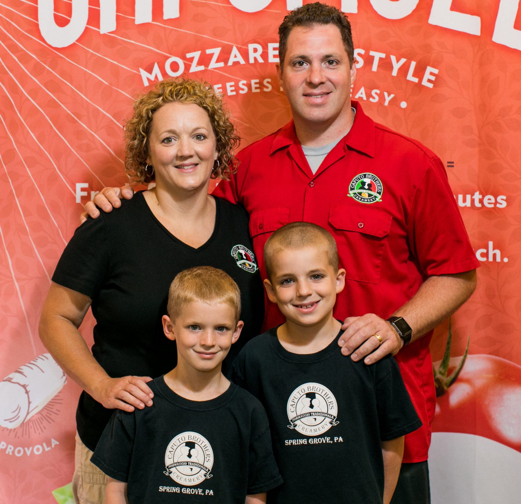 Rynn Caputo (L) with husband David Caputo and the Caputo Brothers, Giovanni and Matteo