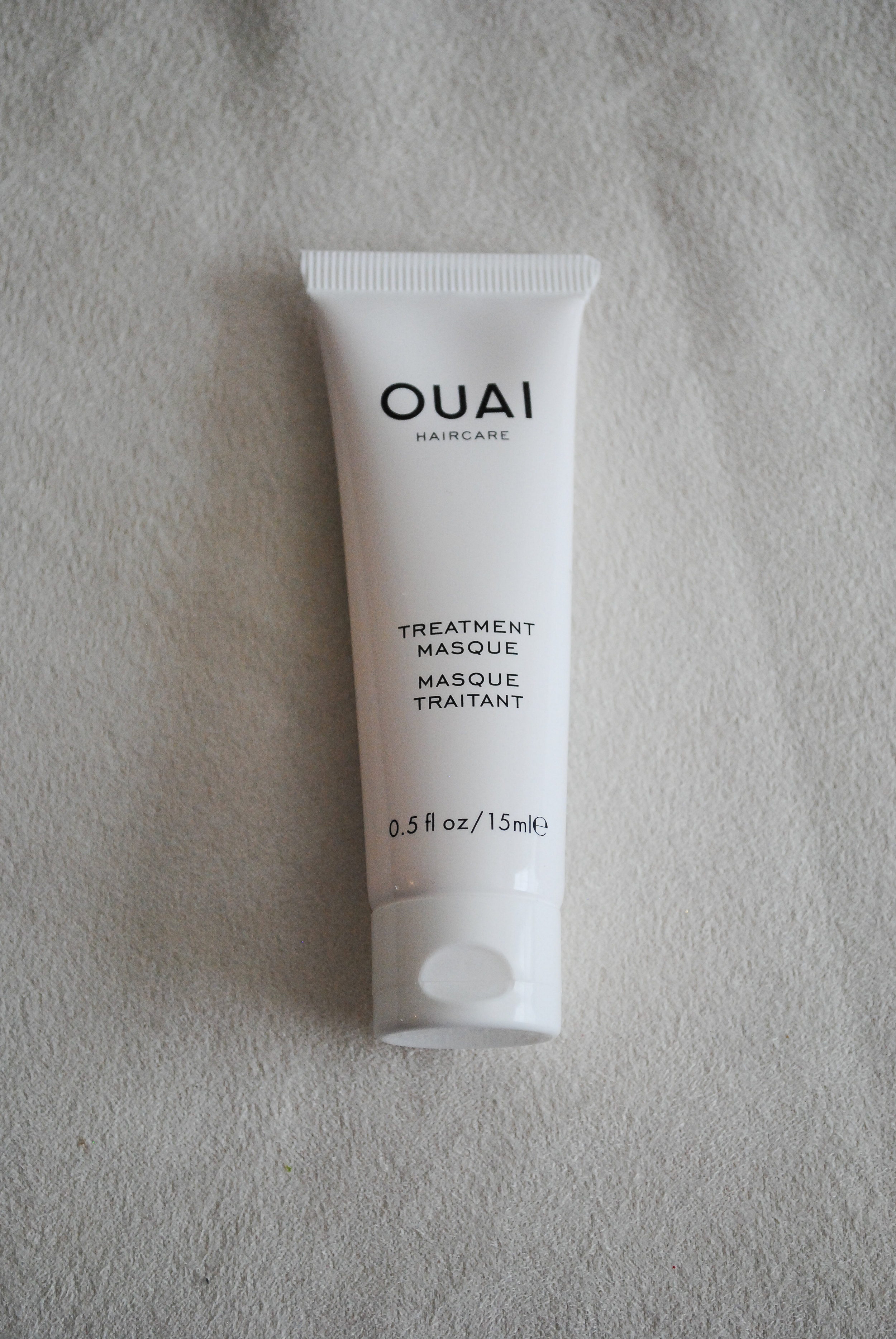 The QUAI Treatment Masque What it claims to do: This restorative mask helps care for damaged hair and leaves strands feeling smooth and touchably soft. This hair mask does leave your hair smooth and soft for sure. Super easy to use too and perfect for after workout showers. Just apply the mask before you shower leave in 5-10 minutes and rinse. You will notice your hair is left silky smooth.