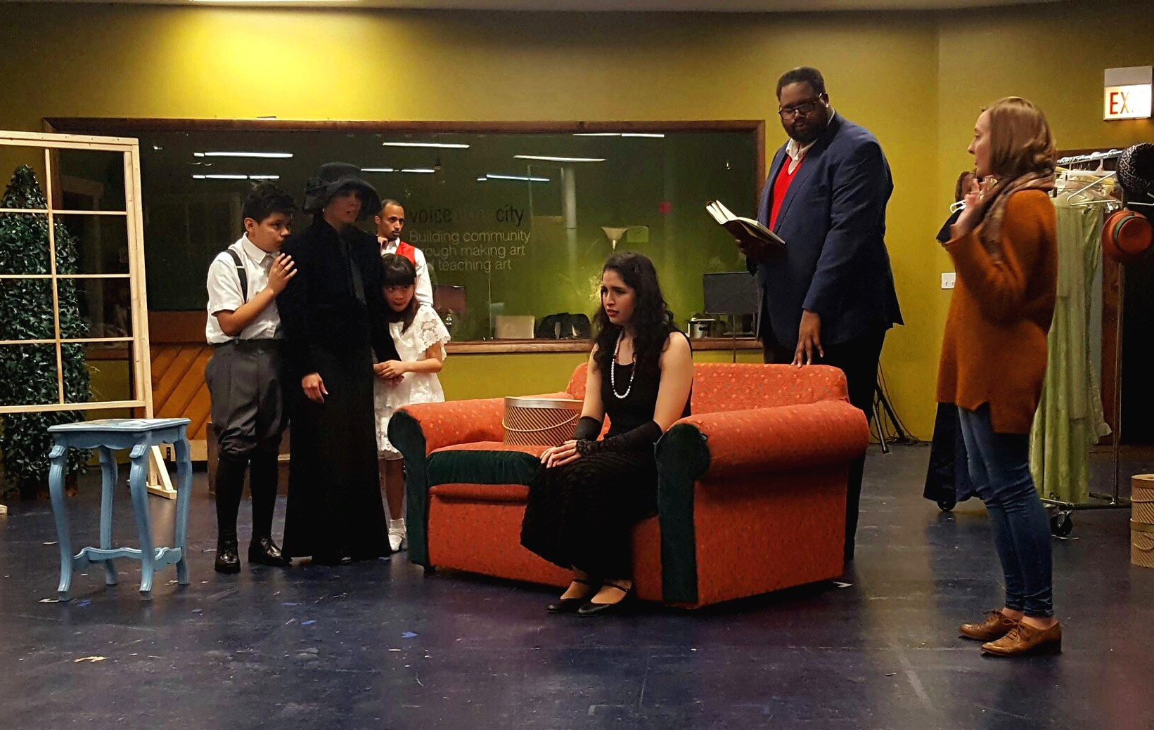 Actress Alejandra Vivanco, center, stars as the Stepdaughter in Ghostlight Ensemble's production of Six Characters in Search of an Author .