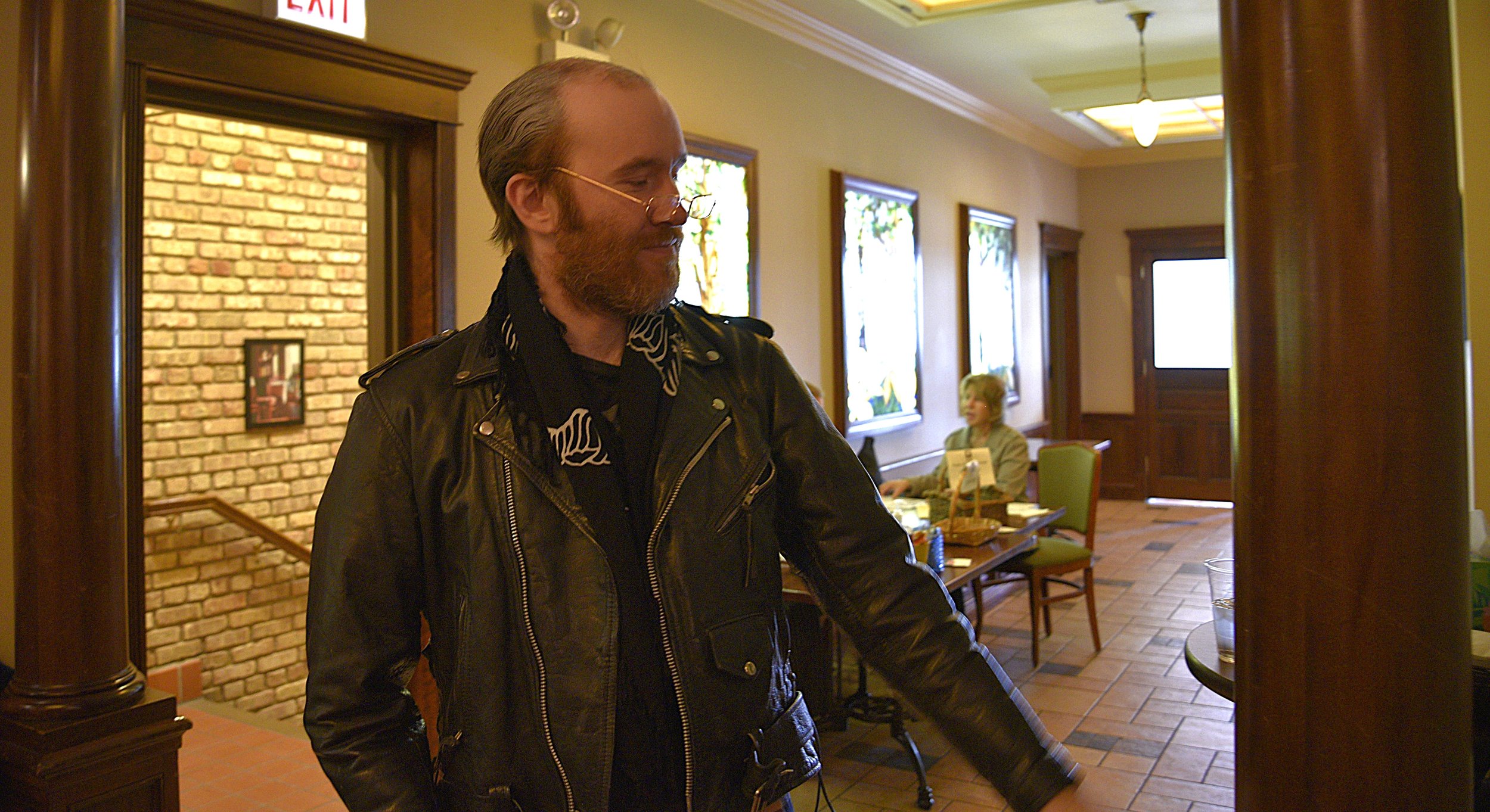 Alex Albrecht in Ghostlight Ensemble’s production of Drink the Past Dry , which ran May 2 to June 1, 2025, at Mrs. Murphy & Sons Irish Bistro. (Photos by Maria Burnham)