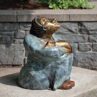 Geometric drawing of an outline square with sections divided by vertical, horizontal, and circle lines.