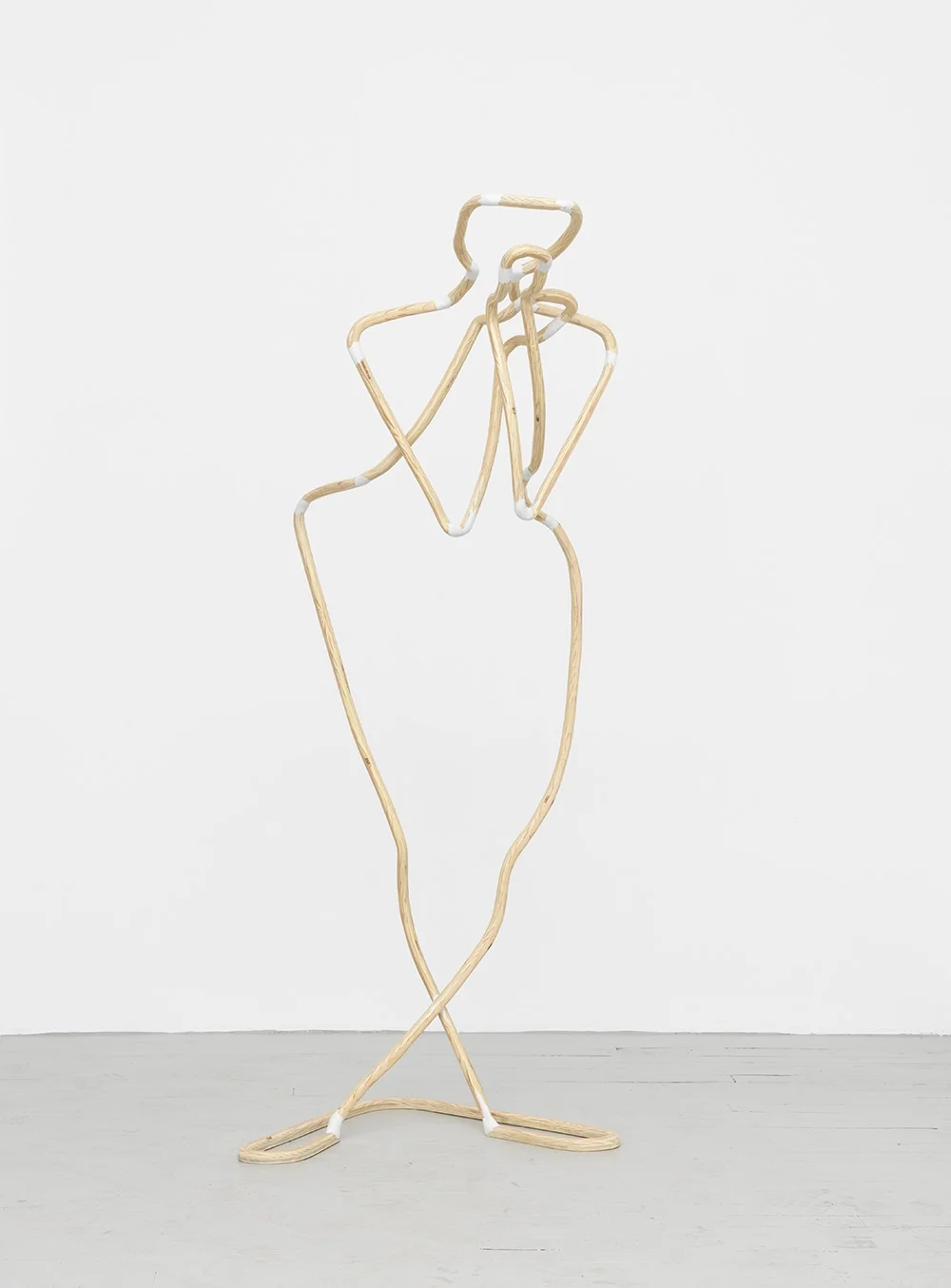 Concentrating , 2016. 60" H 22" W 30" D. Plywood, epoxy putty, wood filler, polyurethane. Lee Relvas.