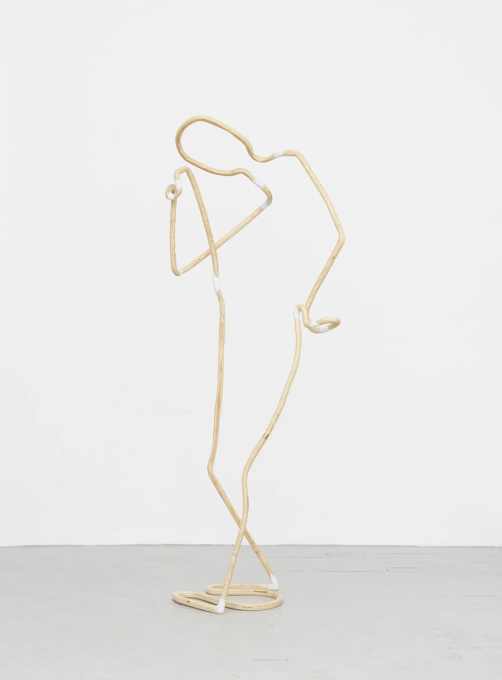Pausing , 2016. 59" H, 25" W, 27" D. Plywood, epoxy putty, wood filler, polyurethane. Lee Relvas.