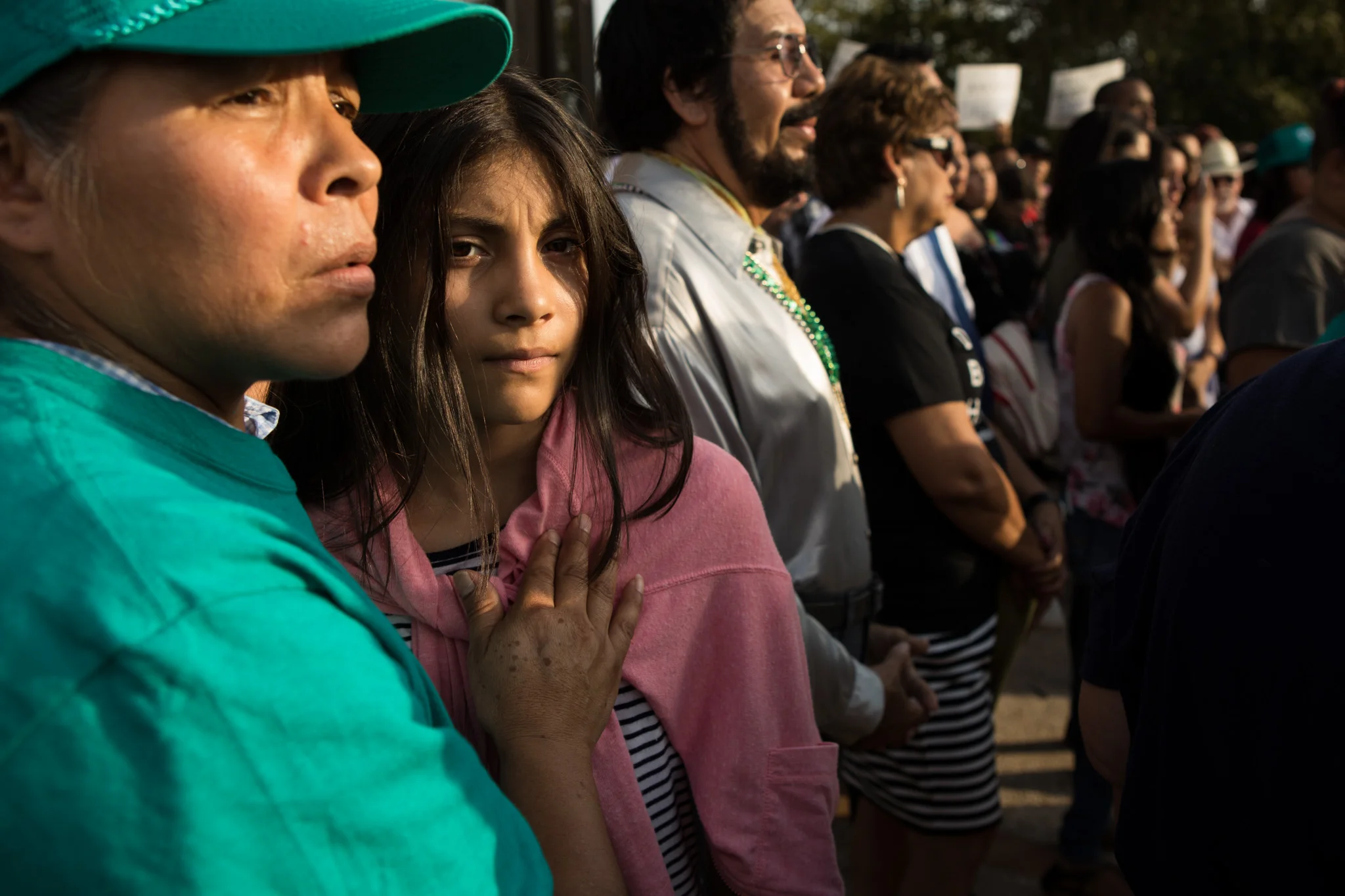 5 September 2017, San Antonio, TX – Juana Arellano and Casandra de Leon hold one another while listening to speakers protest the Trump administration's decision to end DACA. (Copyright Bonnie Arbittier) Institute for Nonprofit News award-winning photograph.