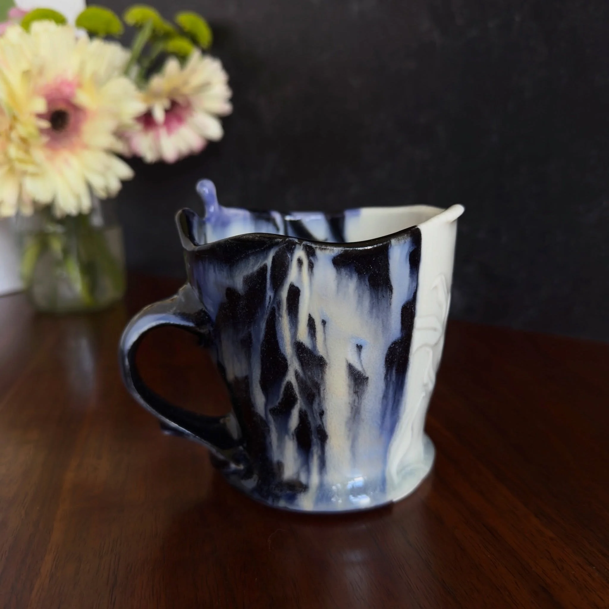 I like making these flat bottom mugs with drips that defy gravity! This one is still available.