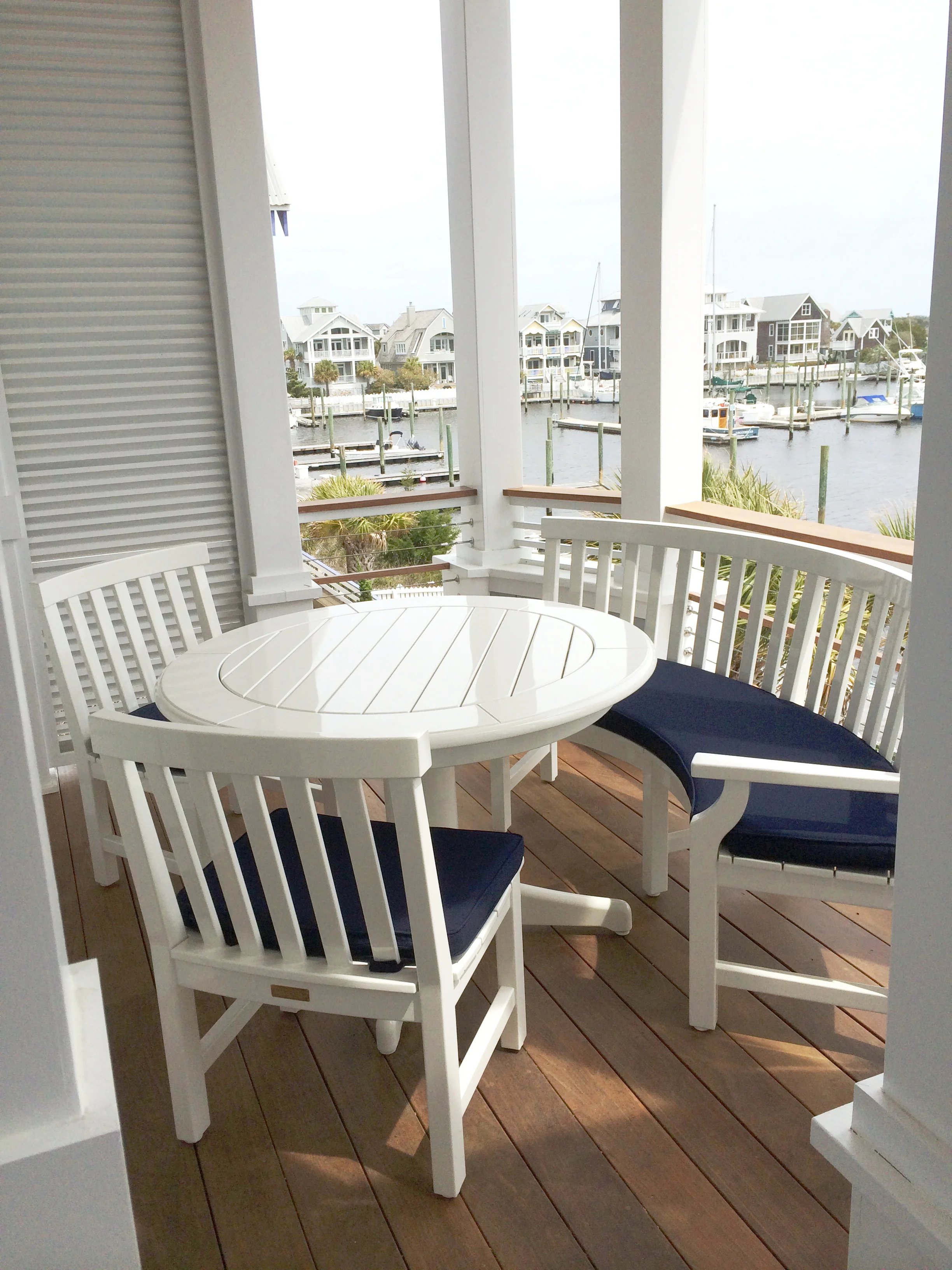 Weatherend table, chairs and bench in the outdoor breakfast nook.