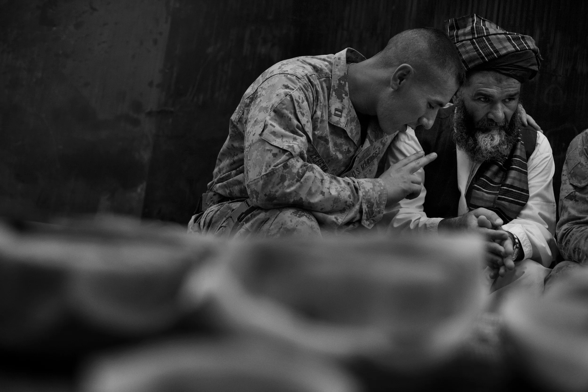  Cpt. Zepeda makes things clear for Haji Bozgul during a shura at COP Turbett. 