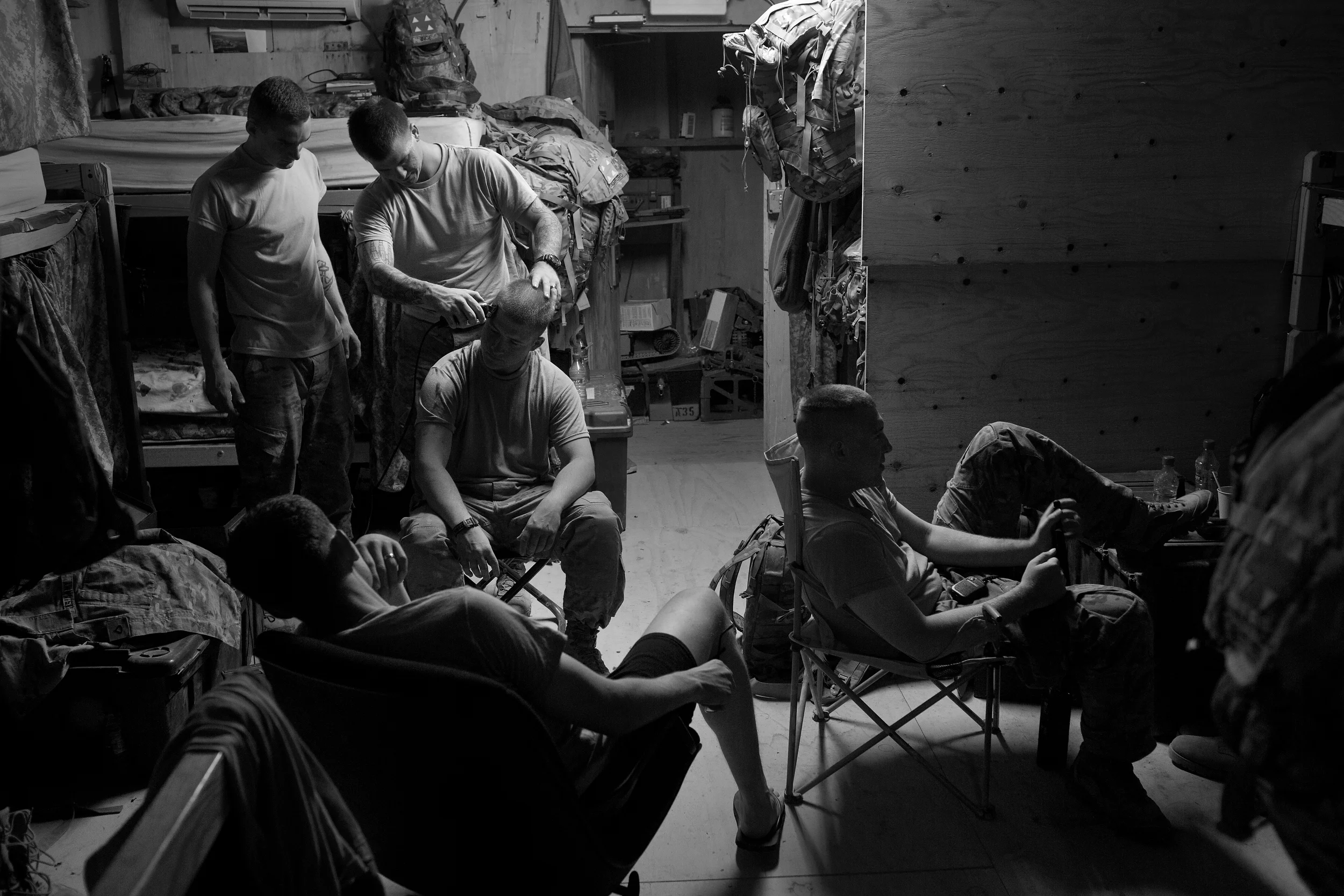  Able Co. of the 1-506 Infantry Battalion get haircuts at COP Chamkani in Paktia. 