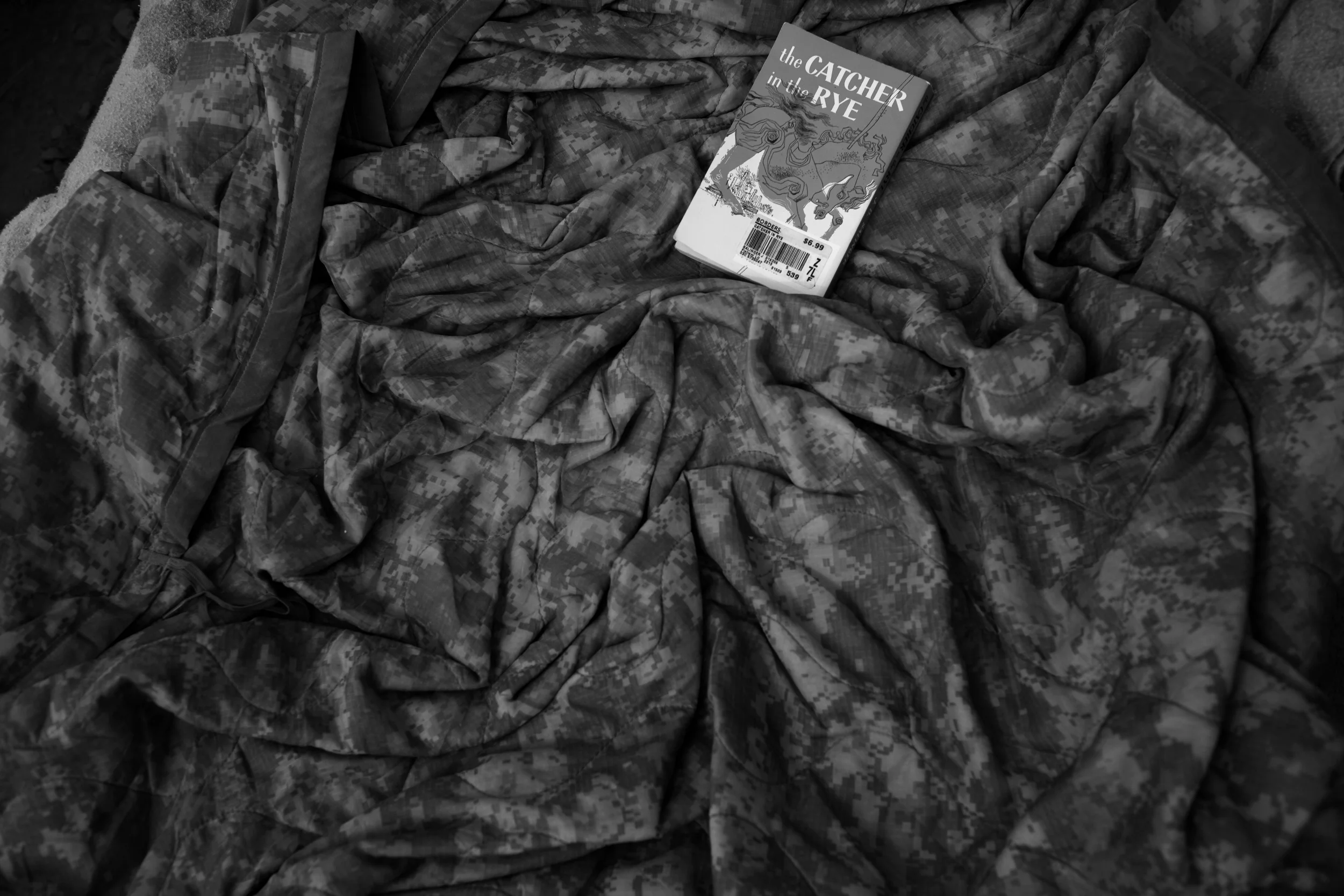  Deployment reading rests on a wubby in the Arghandab valley. 