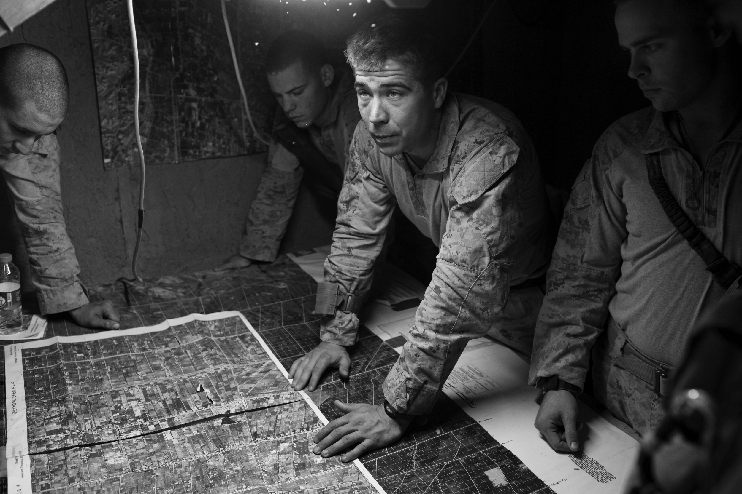  Sgt. Stokes conducts a pre-mission brief before a patrol, COP Turbett. 