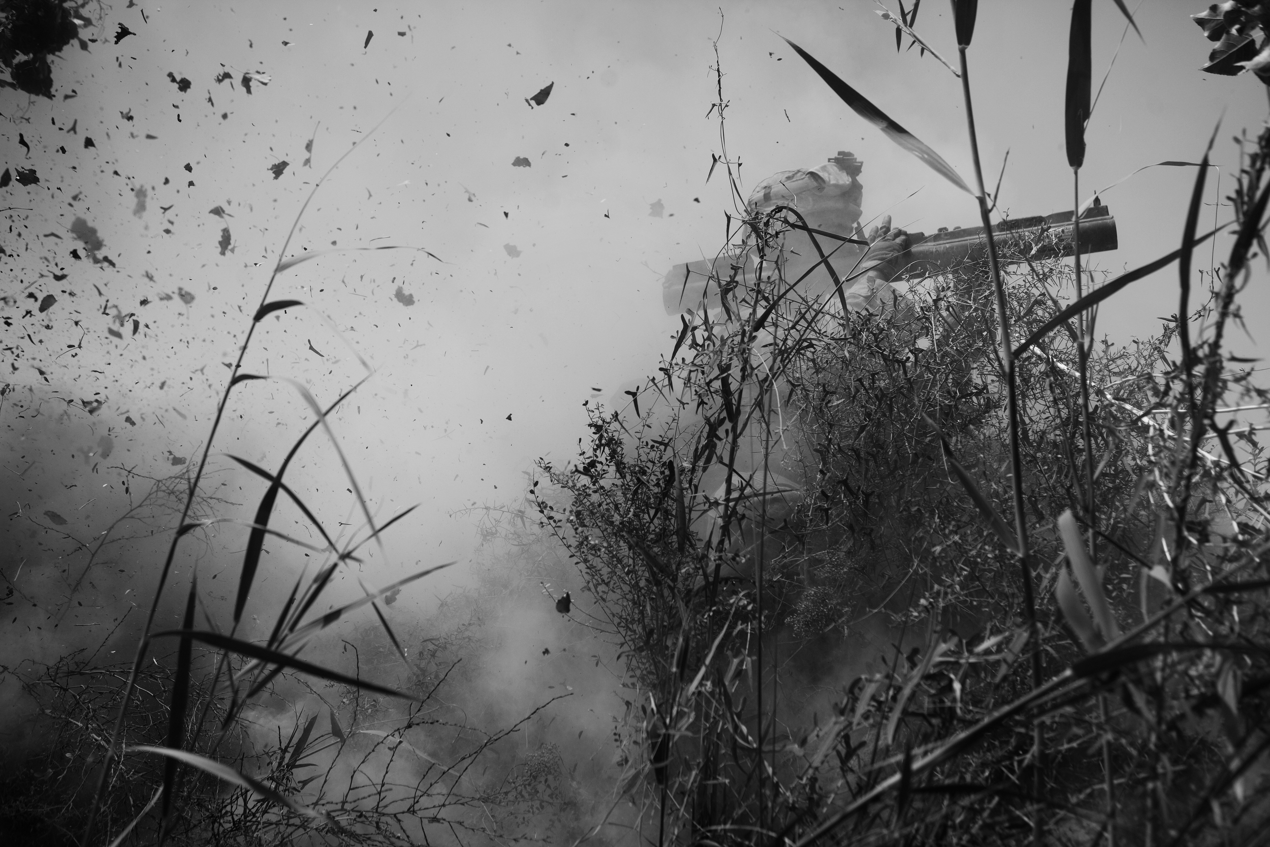  Lnc. Cpl. Mullins fires a LAW rocket at insurgents during a fight in Marjah. 