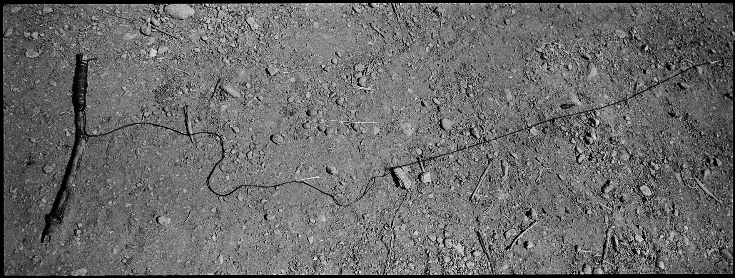  A pull string, attached to a live IED left after a firefight, Chor-Cherey, Marjah. 