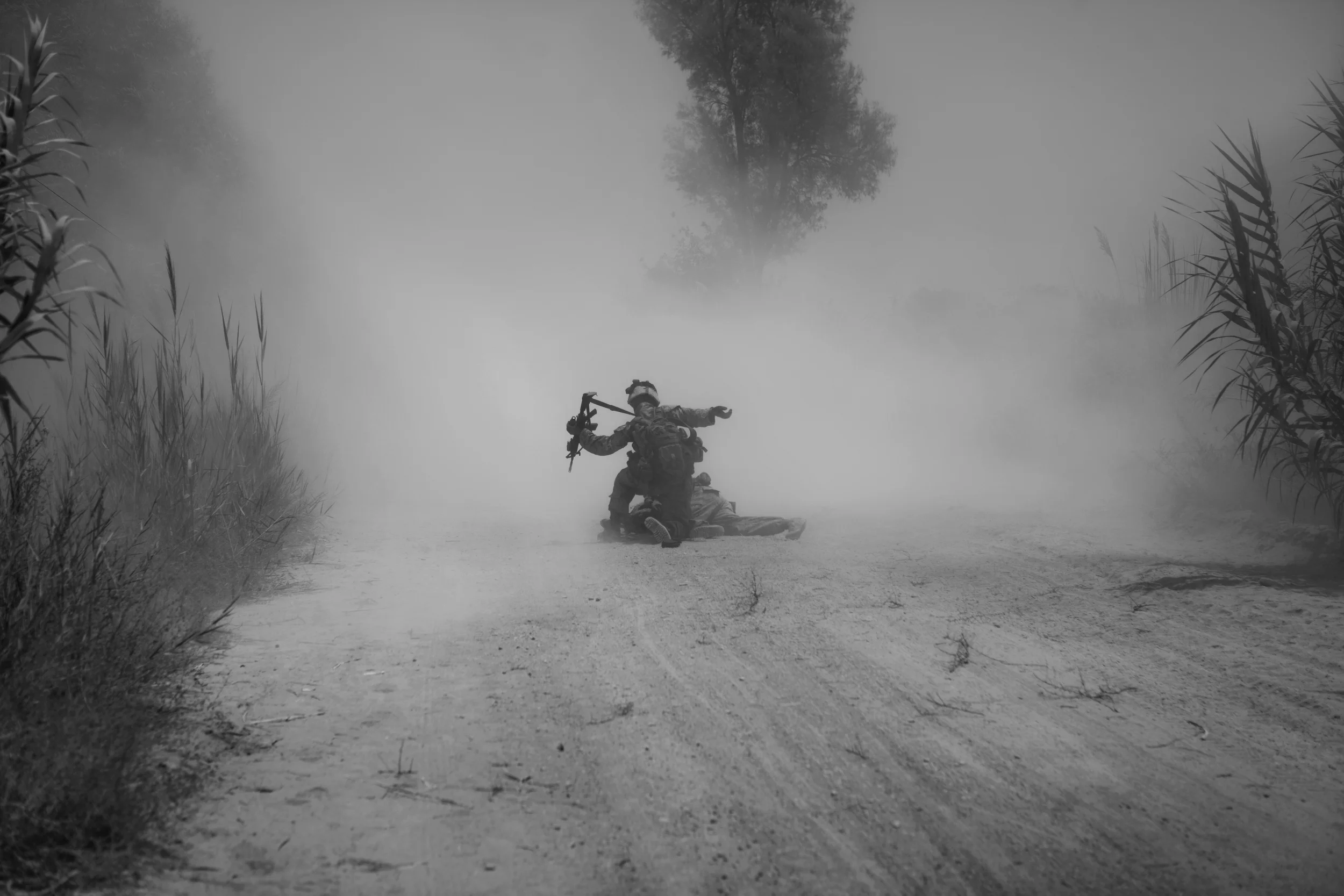  Cpl. Eric Hopp rushes to save Cpl. Manuel Jimenez after he is hit with an IED on patrol in Marjah. 