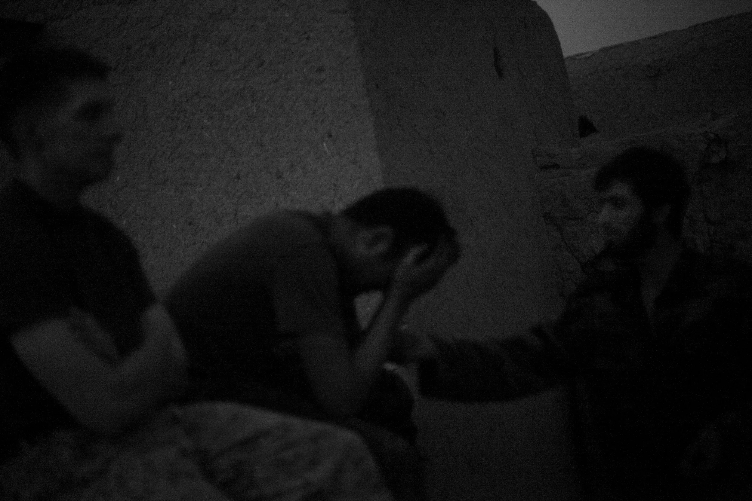  Lt. Matthew Stuhler sits up with Afghan soldiers after they lose seven of their own, Marjah. 