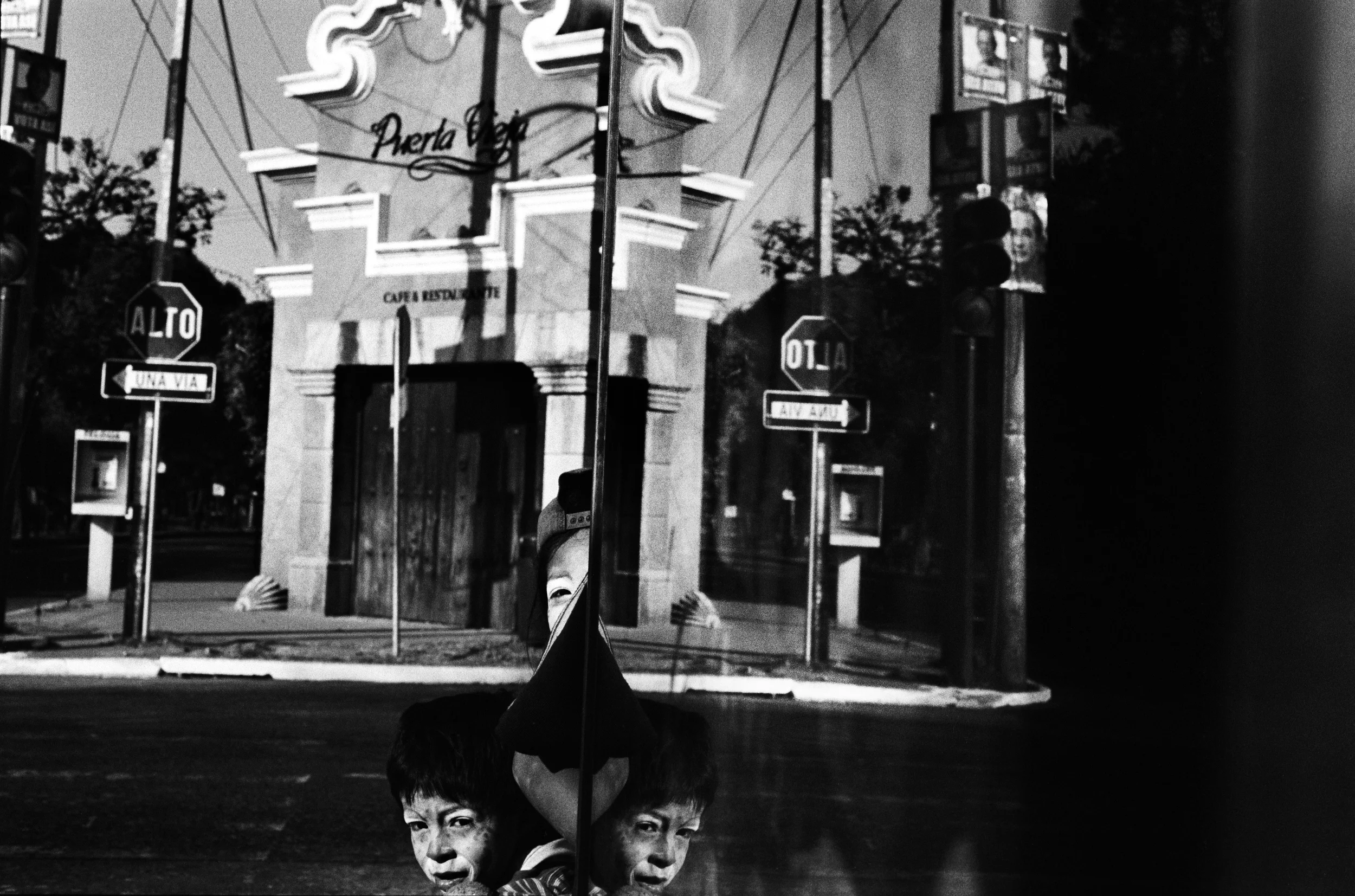  Children dressed as clowns beg in Guatemala City. 
