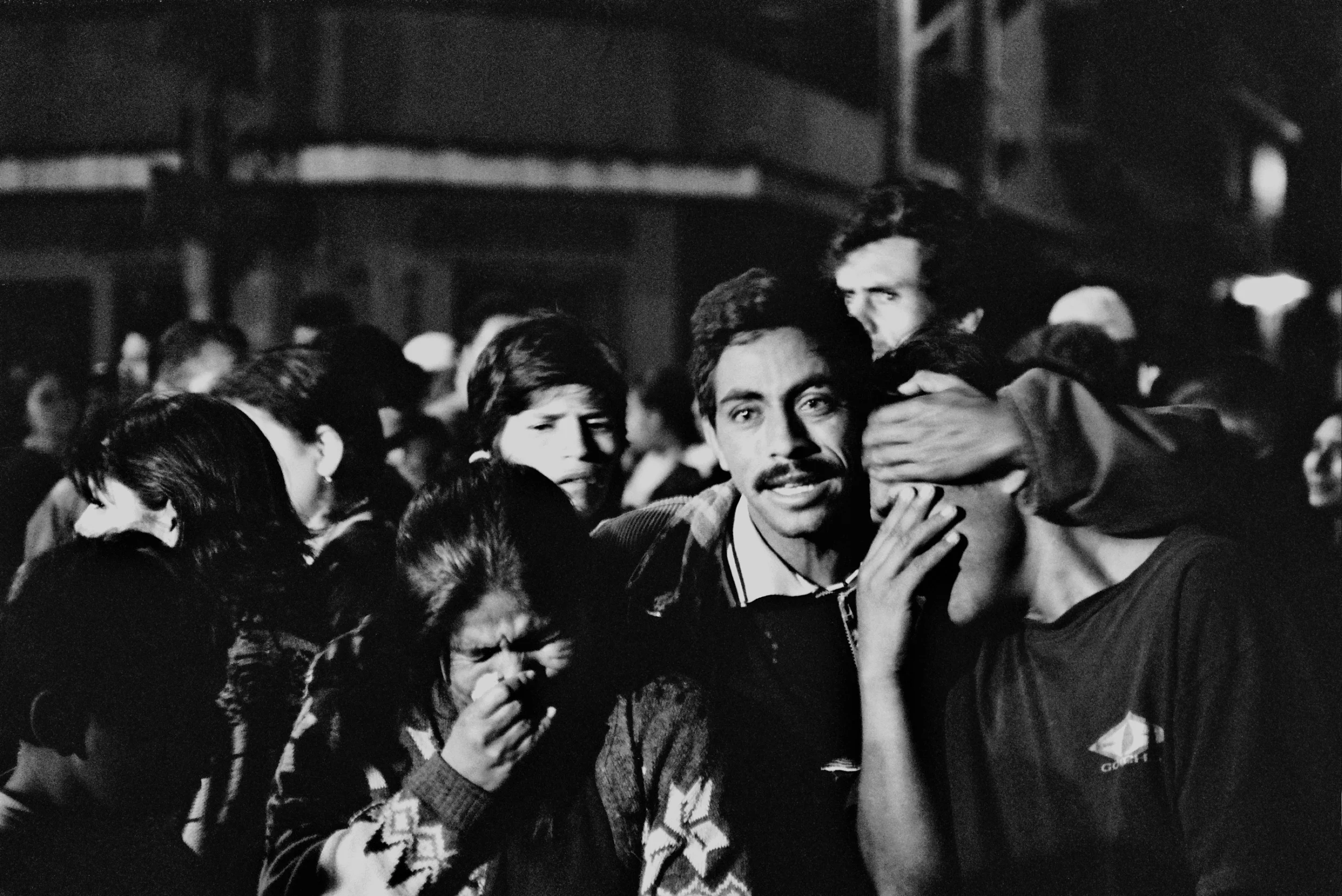  Parishioners mourn the death of their priest, Padre Chemita. 