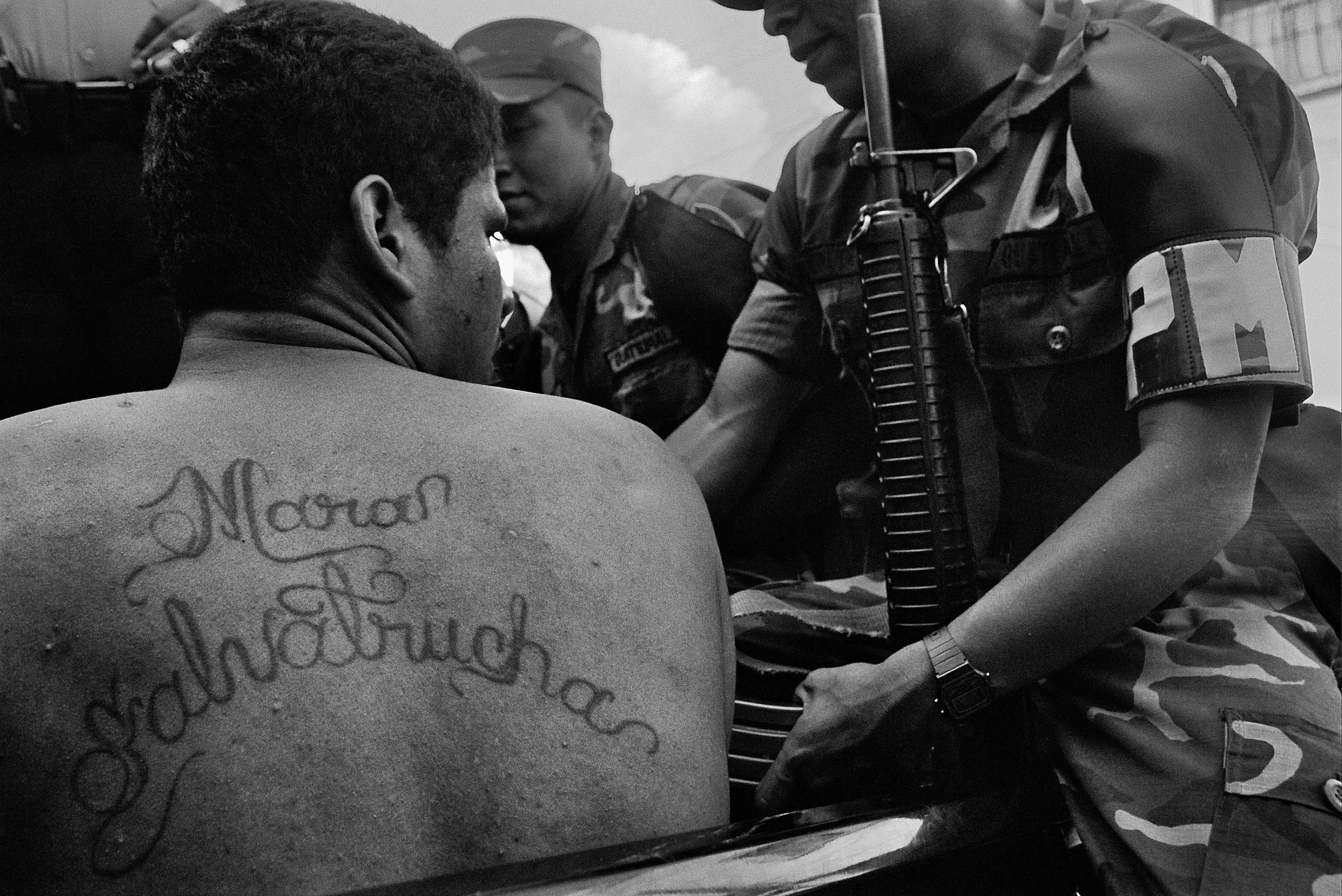  Police round up members of the Mara Salvatrucha, or MS-13, during a raid. 