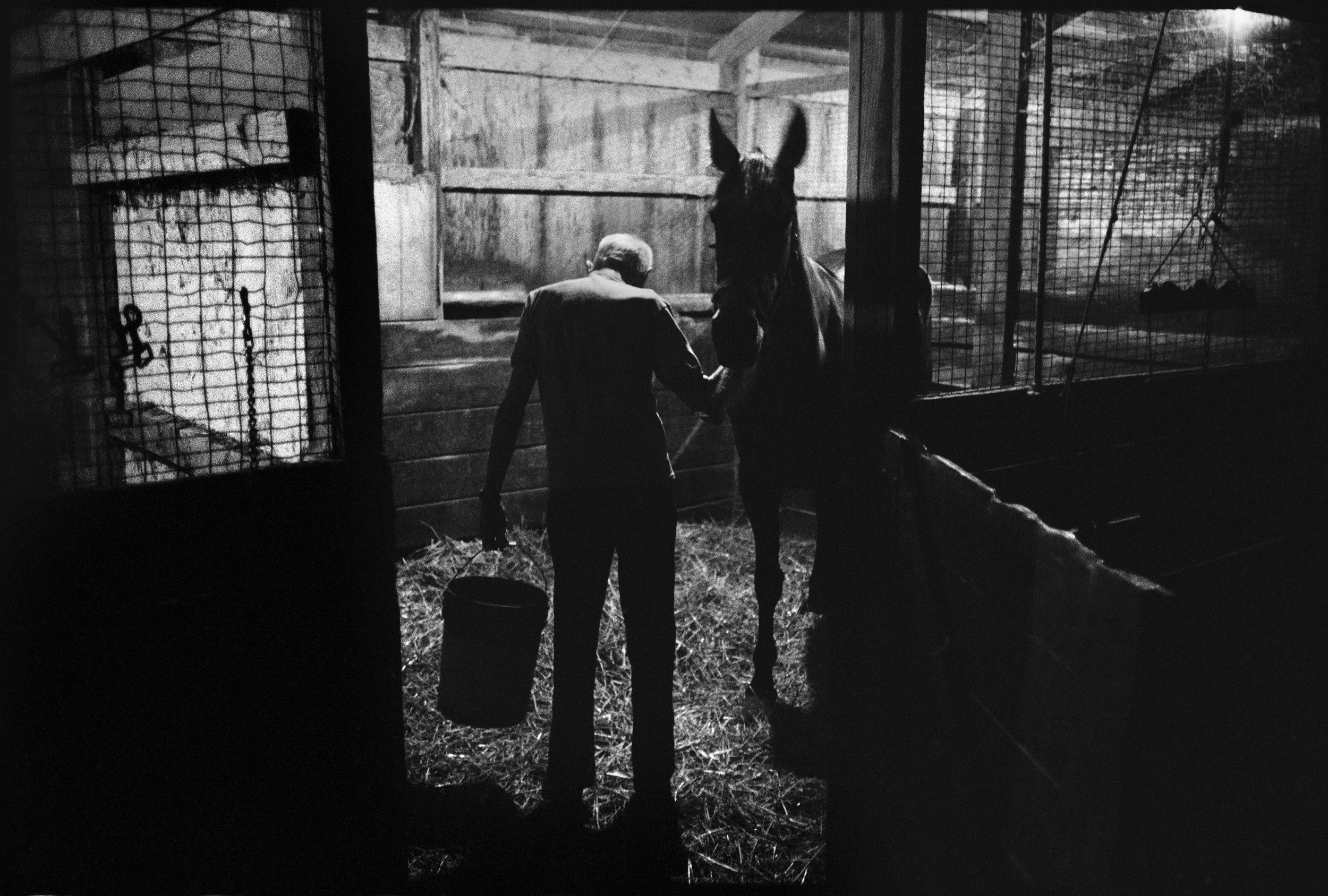  Filling water buckets for the night. 