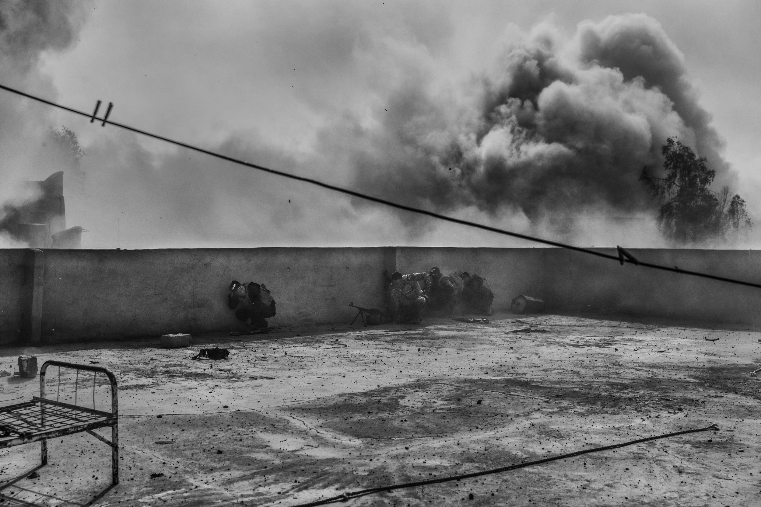  Bricks rain down from the blast. 