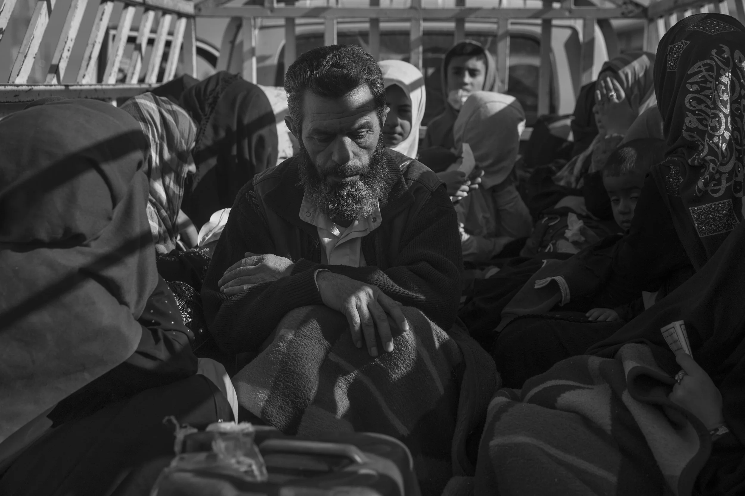  Refugees from the village Julekhan flee the fighting east of Mosul. 