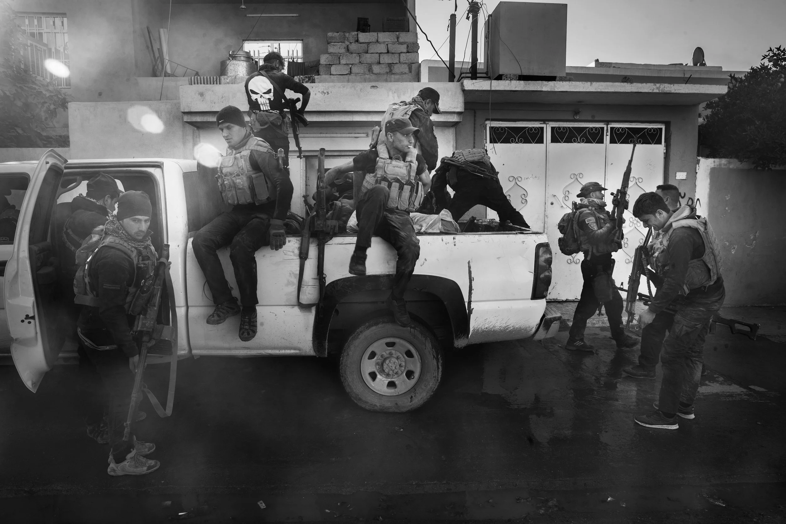  SWAT pile out of a pickup in Hael Aden. 