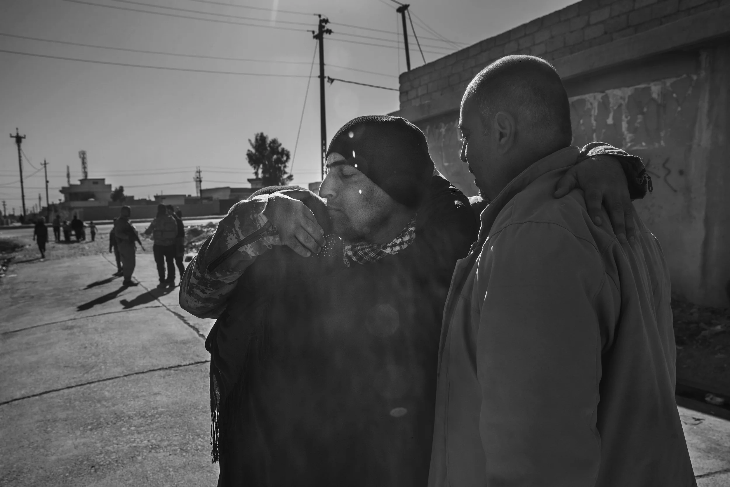  Cpl. Ehab Rafa embraces family members for the first time in two years since the ISIS takeover of Mosul. 