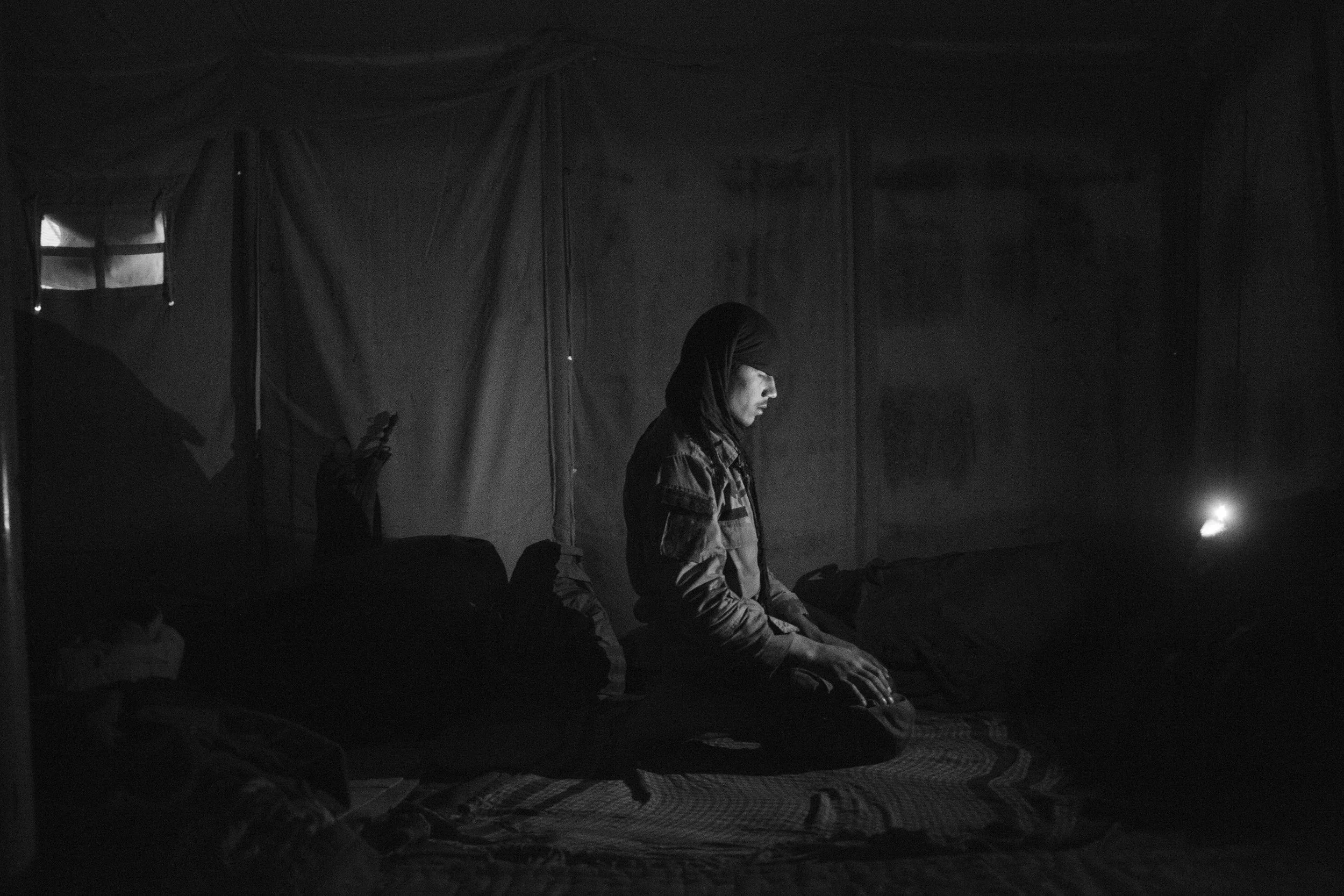  Afghan Commando at prayer.&nbsp; 