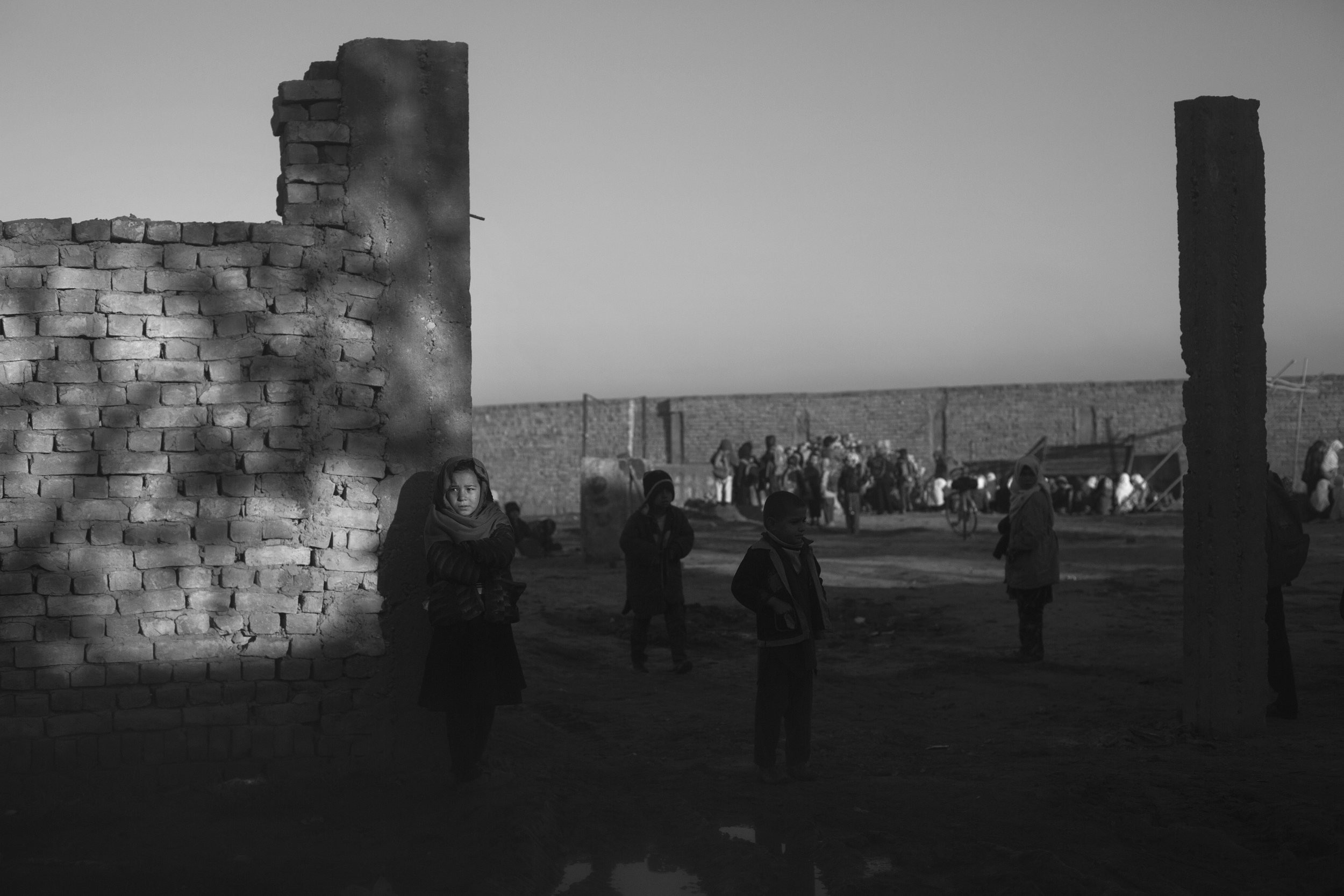  Kids arrive at their outdoor school. 