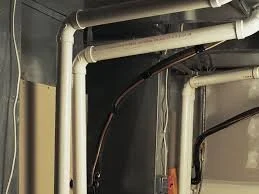 Why are there plastic PVC pipes on my furnace instead of a metal exhaust flue?