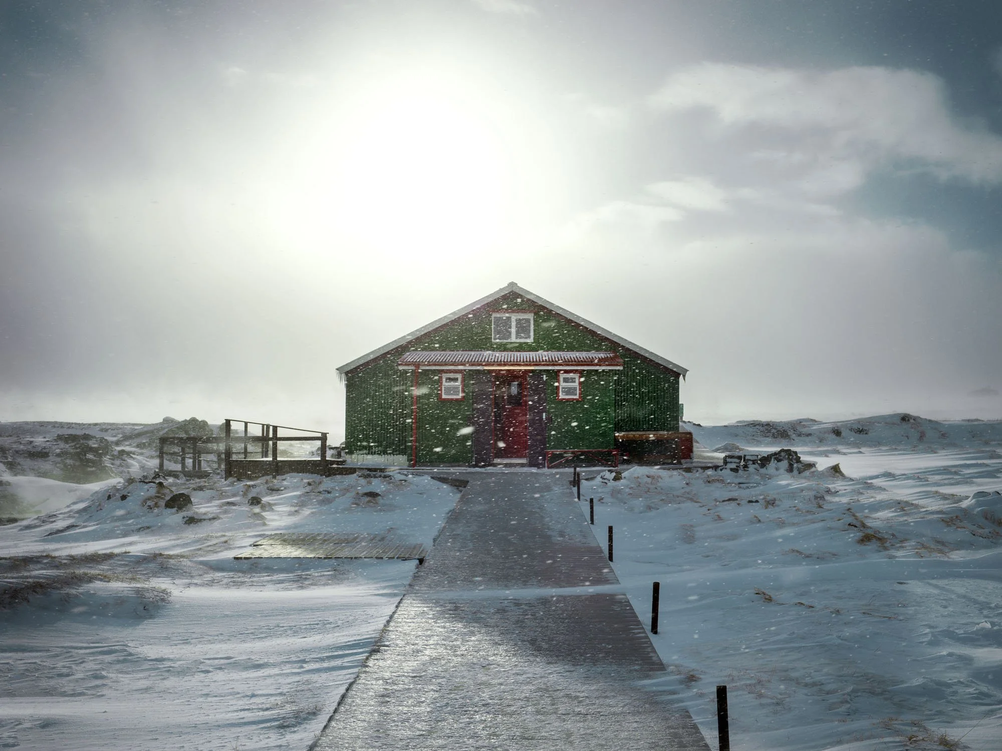 Green house with a red roof surrounded by snow