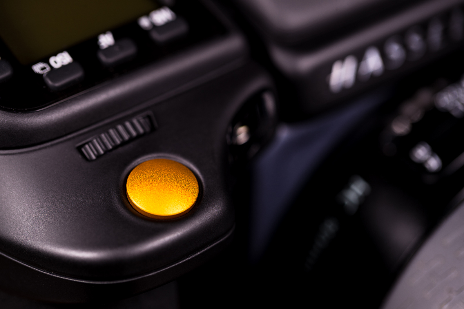 The highlight of the new design is the bright orange shutter release. The orange is symbolic and a celebration of Hasselblad — a color they've carried into other products (like the X1D) moving into the future.