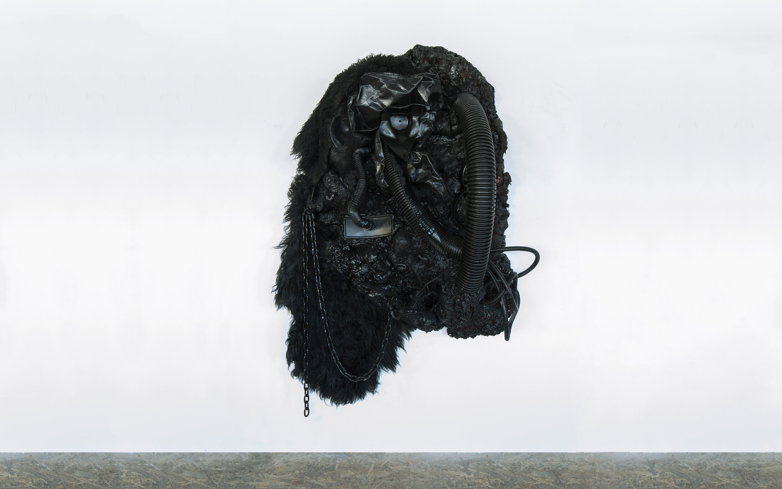  Mask, 2020, 180x110x60 cm, oil, gesso, acrylic, recycled plastic, plastic tubes, metal wire, rope, mannequin, synthetic plants, animal fur, wood branches, metal chain,  batman toy 1993, polyurethane foam on wood 