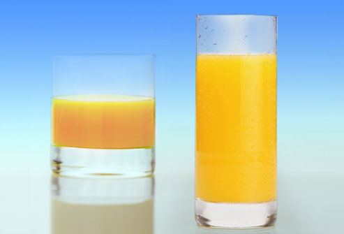 Figure 1: We will tend to, on average pour more juice into the wider glass than the tall one, even though the two glasses hold the same capacity.