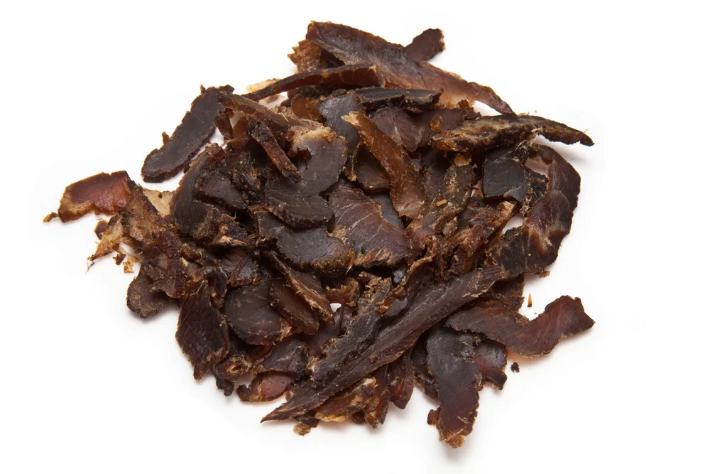 Biltong (pictured) is similar to beef jerky, also a great high protein snack. Biltong is spiced, cured then dried strips of beef whereas jerky is cooked then dried. Most supermarkets stock packets of these making them a great option on the go. However, these can be expensive.