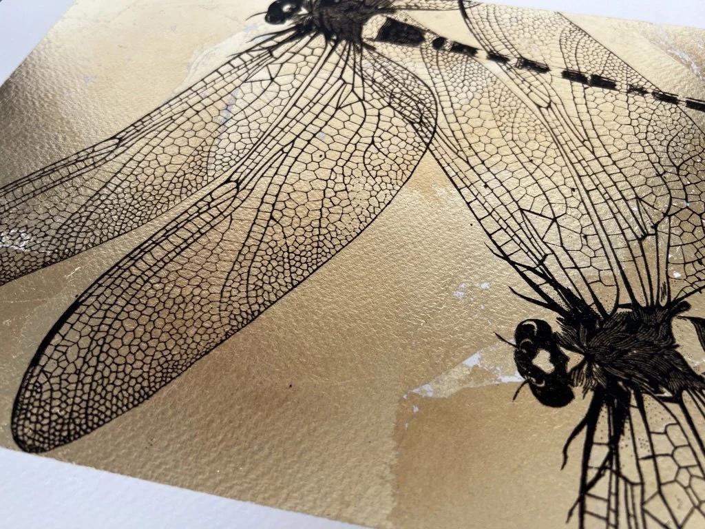 dragonflies on gold close up.jpg