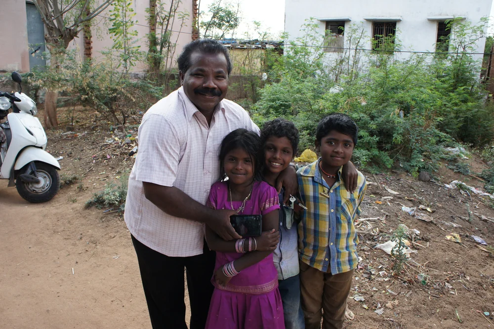 Rev. David and some of the children he knows