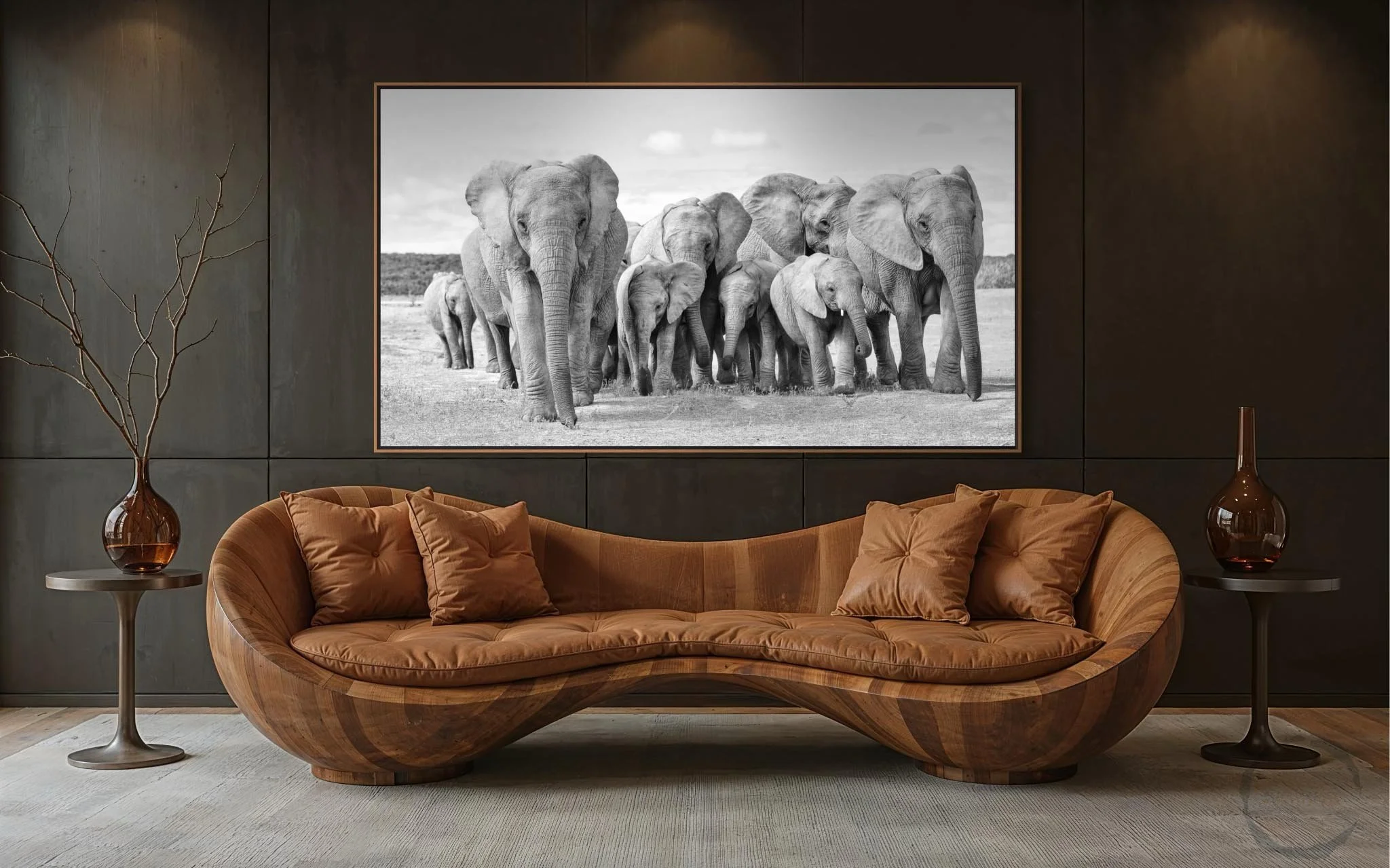 ramed acrylic print of Elephant Family “Ubuntu” displayed above a modern wooden sofa with leather cushions