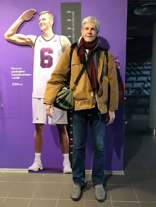 Kristaps Porzingis, at 7'3" the most famous (and tallest) Latvian in NY. (Sturgis Warner added to photo for size comparison)