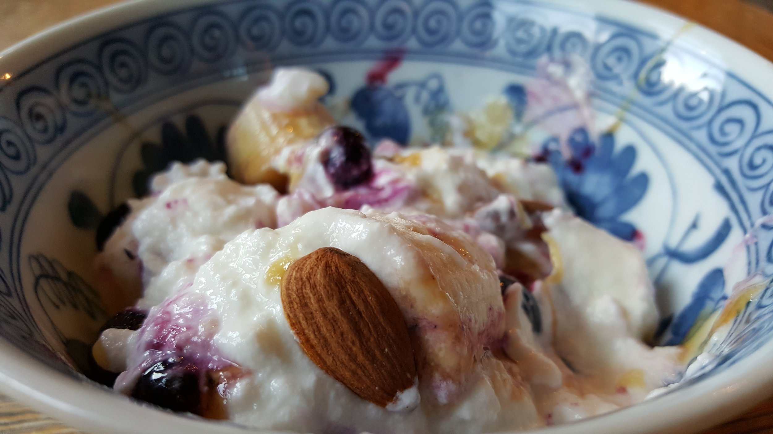 Post run Breakfast- Yogurt with blueberries, bananas, almonds and a drizzle of Oregon raw honey from the property