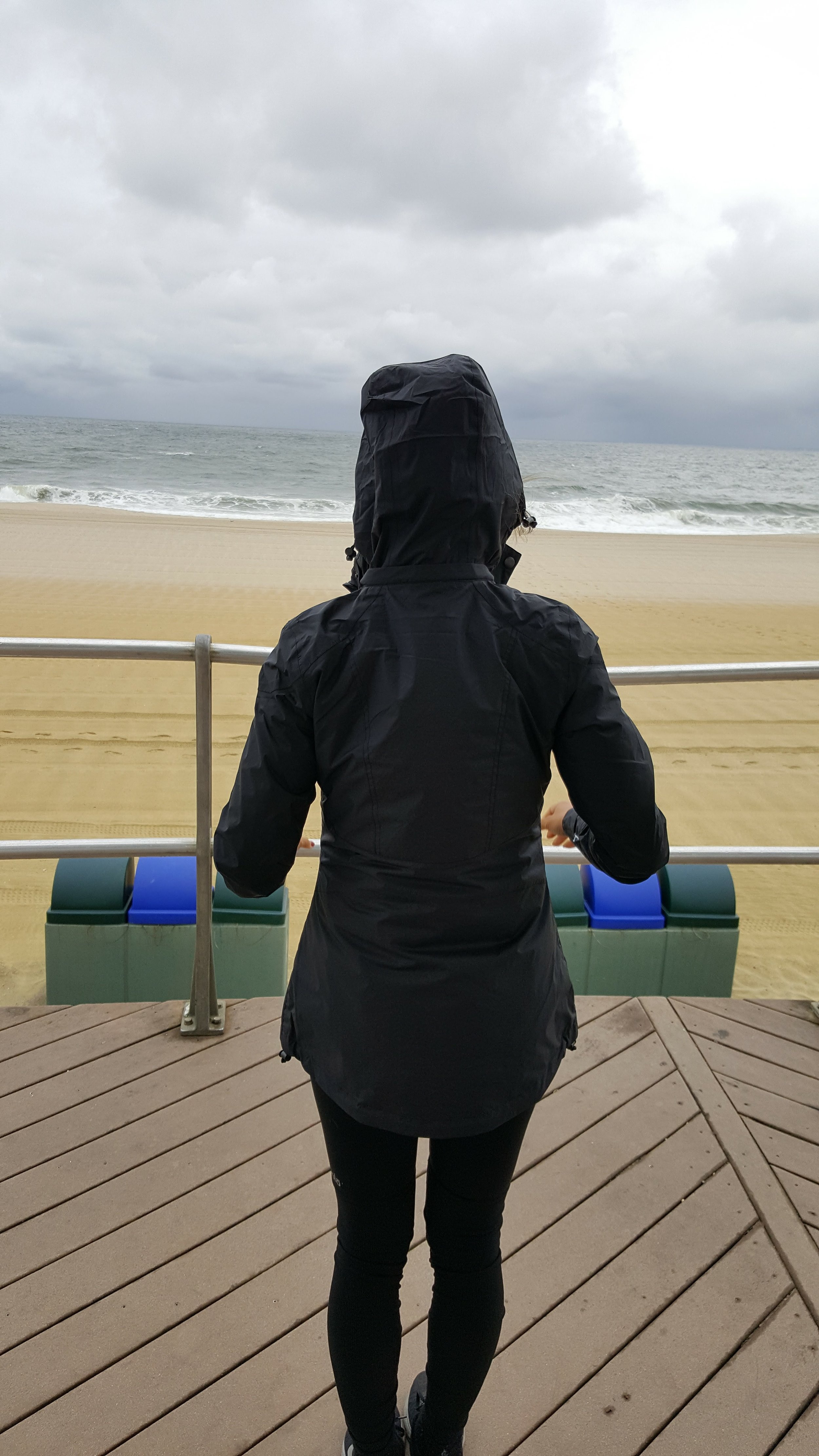 This jacket has a hood, which you can easily zip back in if you don't want it out