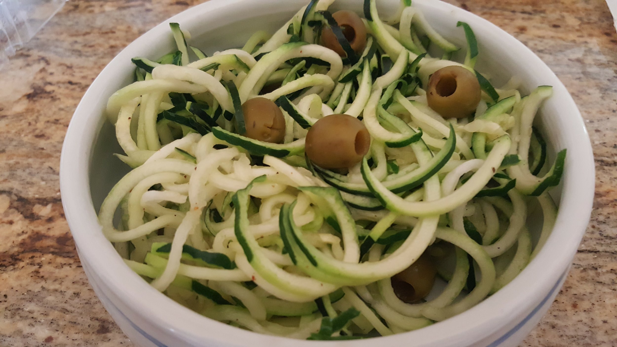 Zucchini noodles with olives + a splash of olive oil