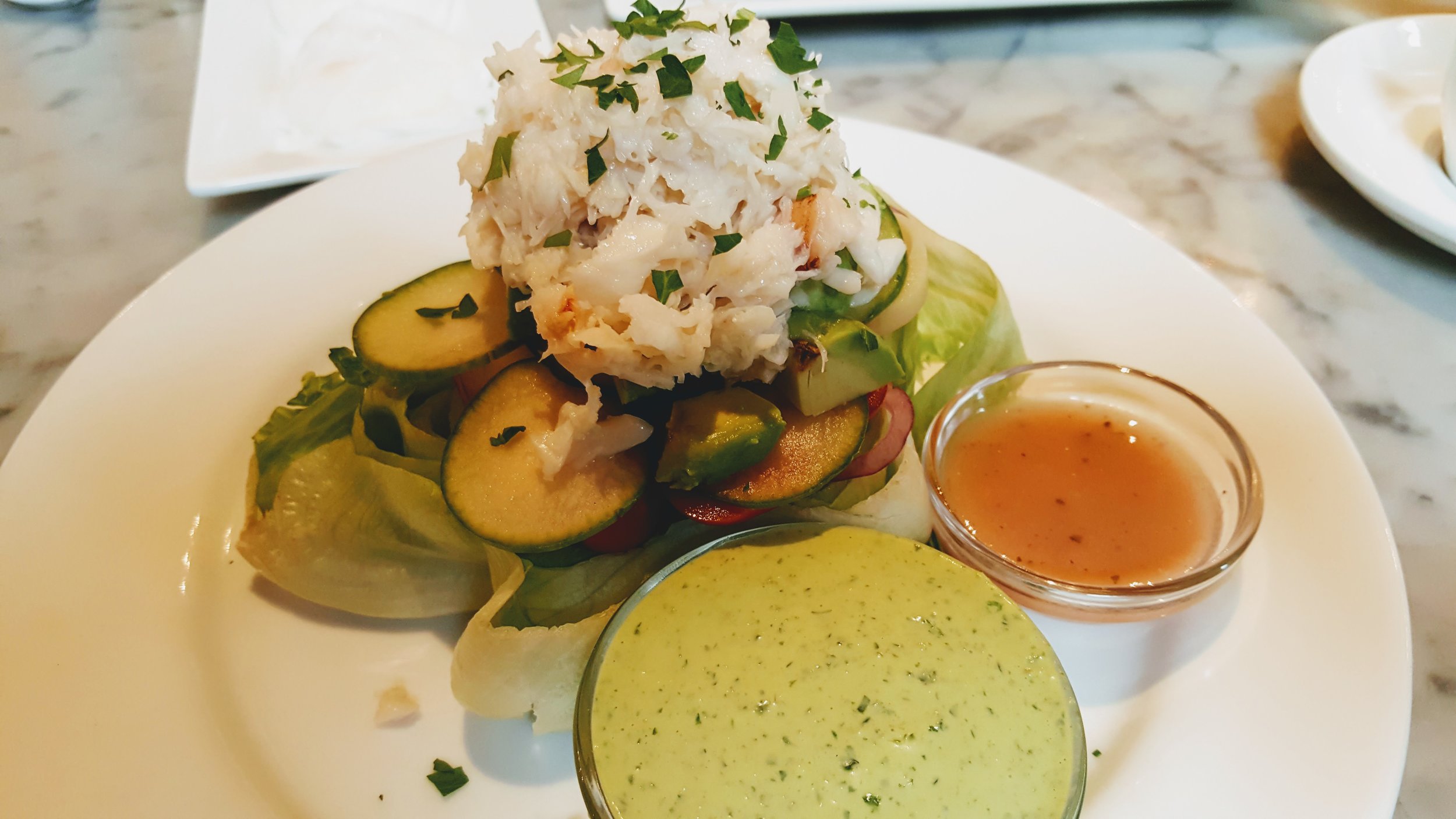 Delicious and healthy salads are served all day at Gracie's the restaurant at Hotel deLuxe.
